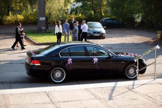 Eksluzywna limuzyna do ślubu BMW 730 E65, czarne z jasnym wnętrzem Poznań