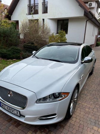 Biały Jaguar XJL Łomianki